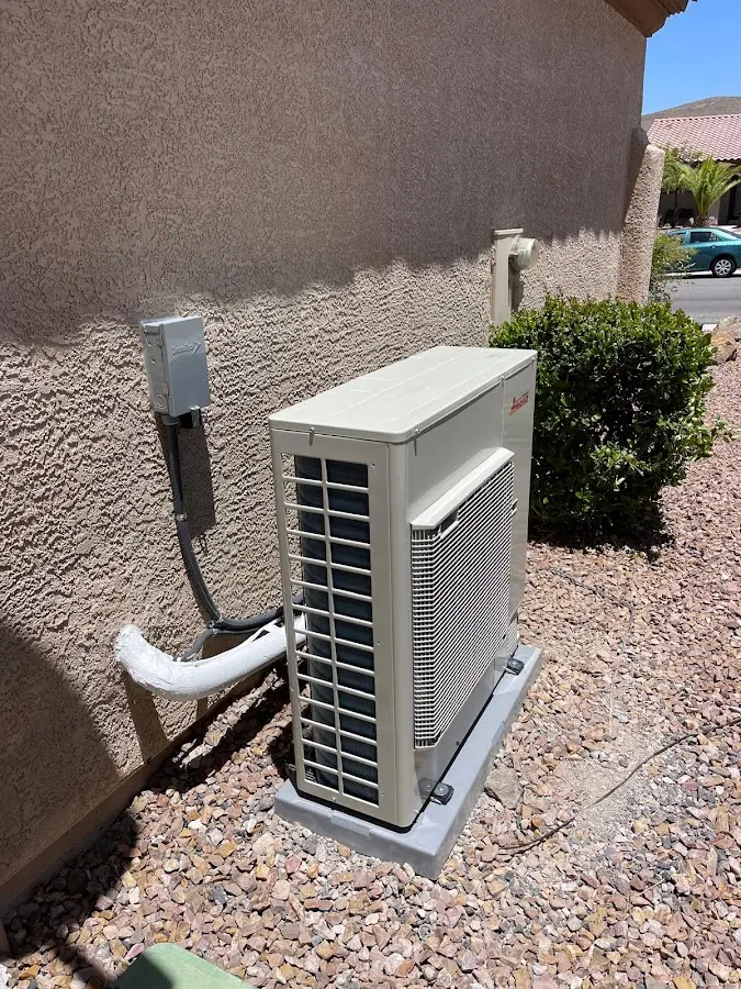 Residential air conditioning condenser unit in Candler-McAfee